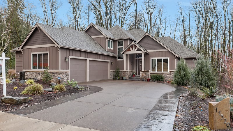 Image for Vidabelo-Elegant Craftsman with Double Master Suites-Front Exterior